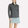 Chaqueta de golf con cremallera completa y costuras de alto rendimiento para mujer Chaqueta de golf con cremallera completa y costuras de alto rendimiento para mujer