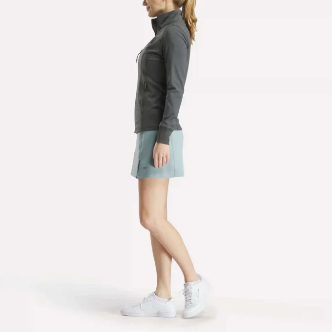 Chaqueta de golf con cremallera completa y costuras de alto rendimiento para mujer Chaqueta de golf con cremallera completa y costuras de alto rendimiento para mujer
