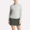 Jersey de golf de manga larga con cremallera de 1/4 y tejido jacquard Vector para mujer Jersey de golf de manga larga con cremallera de 1/4 y tejido jacquard Vector para mujer