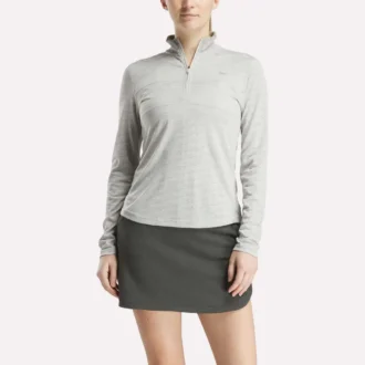 Jersey de golf de manga larga con cremallera de 1/4 y tejido jacquard Vector para mujer
