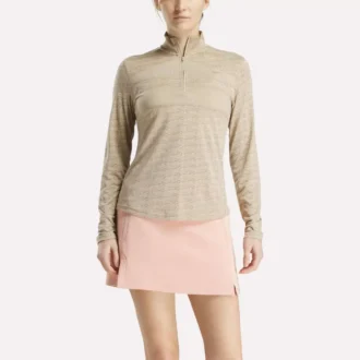 Jersey de golf de manga larga con cremallera de 1/4 y tejido jacquard Vector para mujer