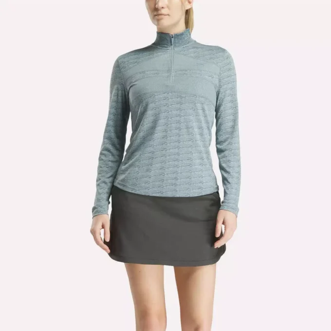 Jersey de golf de manga larga con cremallera de 1/4 y tejido jacquard Vector para mujer Jersey de golf de manga larga con cremallera de 1/4 y tejido jacquard Vector para mujer