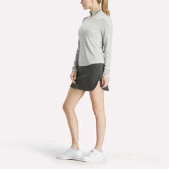 Jersey de golf de manga larga con cremallera de 1/4 y tejido jacquard Vector para mujer