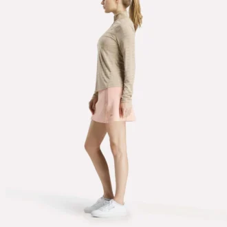 Jersey de golf de manga larga con cremallera de 1/4 y tejido jacquard Vector para mujer