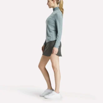 Jersey de golf de manga larga con cremallera de 1/4 y tejido jacquard Vector para mujer
