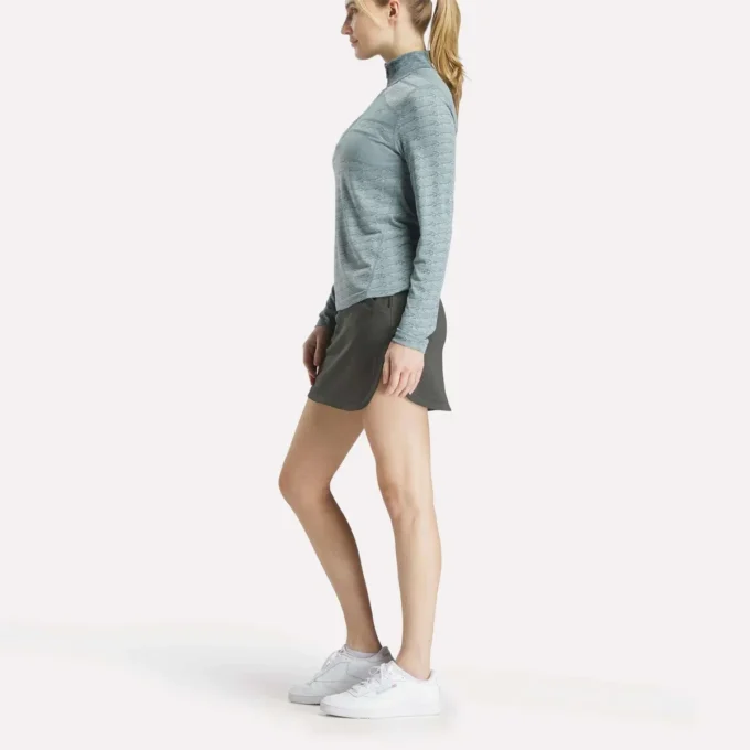 Jersey de golf de manga larga con cremallera de 1/4 y tejido jacquard Vector para mujer Jersey de golf de manga larga con cremallera de 1/4 y tejido jacquard Vector para mujer