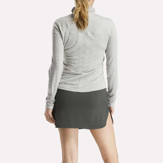 Jersey de golf de manga larga con cremallera de 1/4 y tejido jacquard Vector para mujer Jersey de golf de manga larga con cremallera de 1/4 y tejido jacquard Vector para mujer