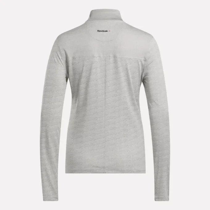 Jersey de golf de manga larga con cremallera de 1/4 y tejido jacquard Vector para mujer Jersey de golf de manga larga con cremallera de 1/4 y tejido jacquard Vector para mujer