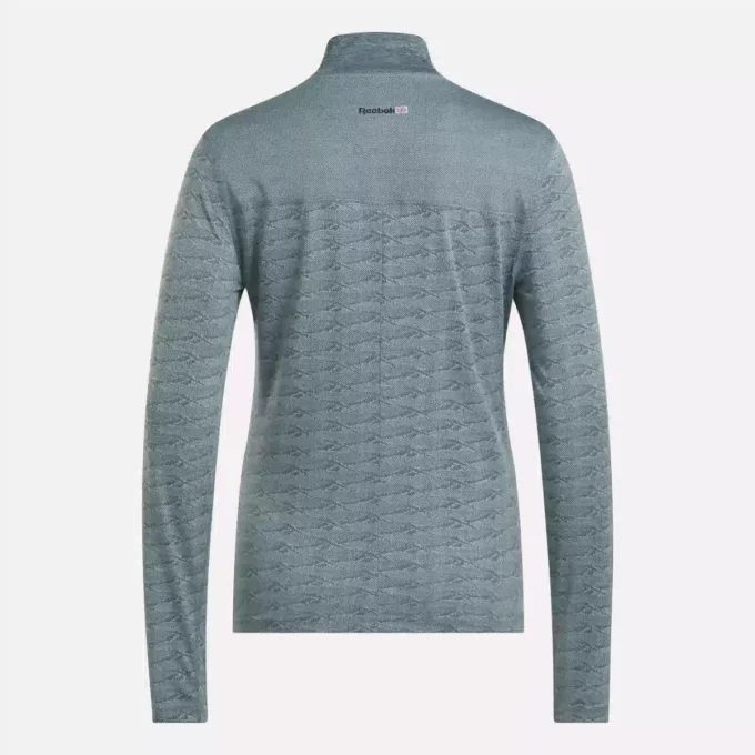 Jersey de golf de manga larga con cremallera de 1/4 y tejido jacquard Vector para mujer Jersey de golf de manga larga con cremallera de 1/4 y tejido jacquard Vector para mujer