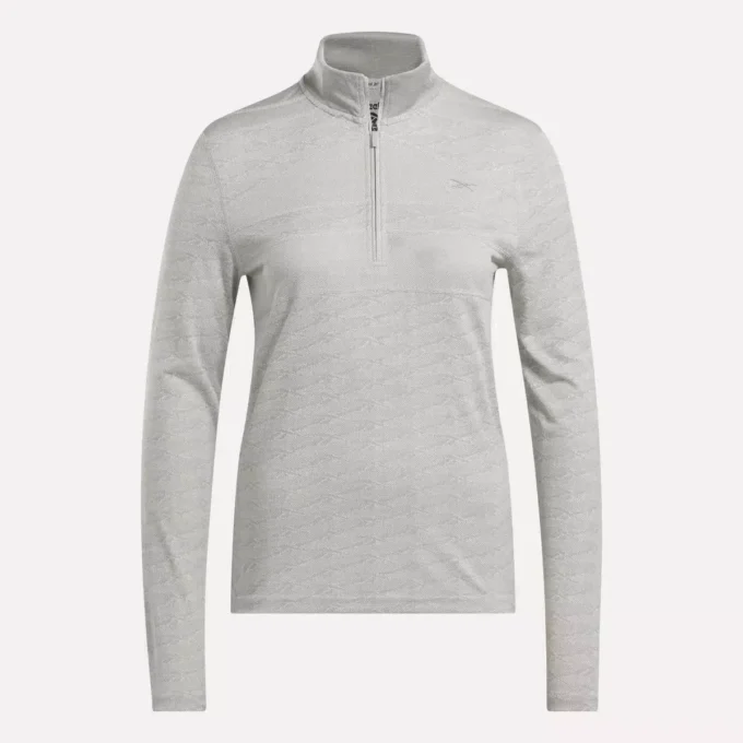 Jersey de golf de manga larga con cremallera de 1/4 y tejido jacquard Vector para mujer Jersey de golf de manga larga con cremallera de 1/4 y tejido jacquard Vector para mujer
