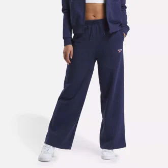 Pantalones anchos de felpa con logotipo pequeño Reebok Identity para mujer
