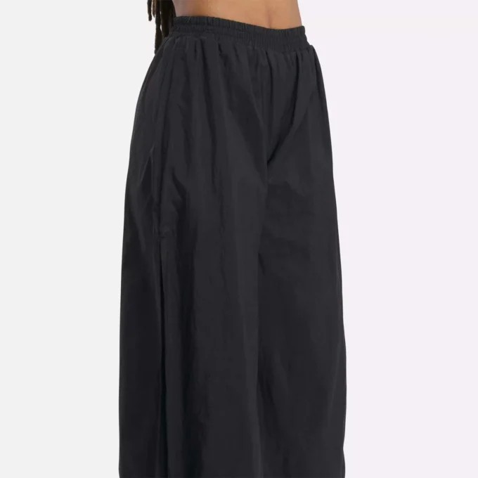 Pantalones clásicos con volumen para mujer Pantalones clásicos con volumen para mujer