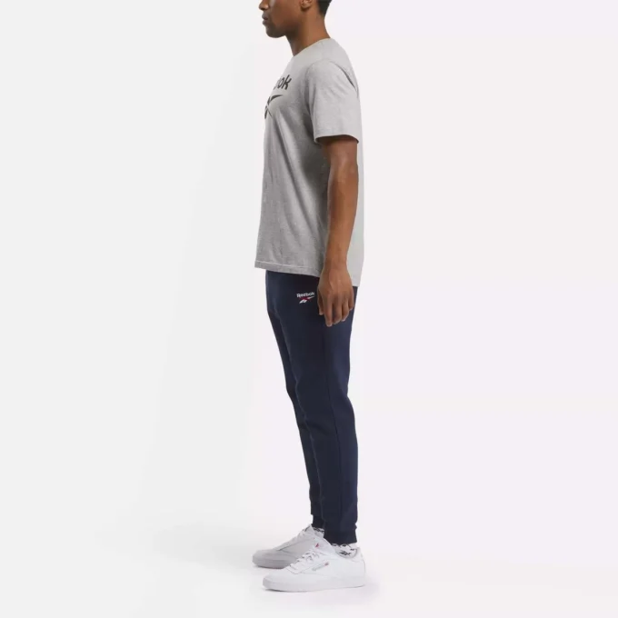 Pantalones de chándal de felpa con logotipo pequeño Reebok Identity para hombre Pantalones de chándal de felpa con logotipo pequeño Reebok Identity para hombre