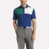 Polo con cuello adherido y bloques de color para hombre