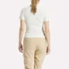 Polo de golf ajustado con cremallera y manga corta para mujer Polo de golf ajustado con cremallera y manga corta para mujer