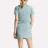 Polo de golf ajustado con cremallera y manga corta para mujer Polo de golf ajustado con cremallera y manga corta para mujer