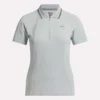Polo de golf ajustado con cremallera y manga corta para mujer Polo de golf ajustado con cremallera y manga corta para mujer