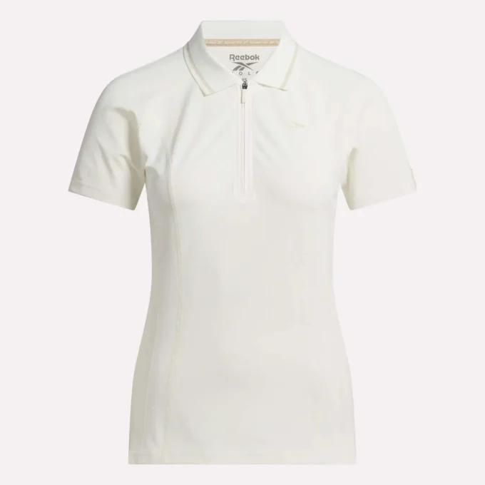 Polo de golf ajustado con cremallera y manga corta para mujer Polo de golf ajustado con cremallera y manga corta para mujer