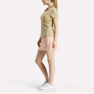 Polo de manga corta con cuello Johnny y estampado floral micro para mujer