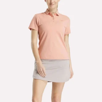 Polo de manga corta con tapeta de piqué elástico para mujer