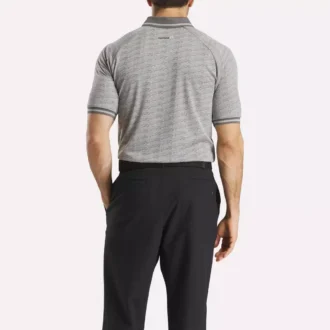 Polo de manga corta para hombre con jacquard Vector tonal y ribete acanalado Polo de manga corta para hombre con jacquard Vector tonal y ribete acanalado