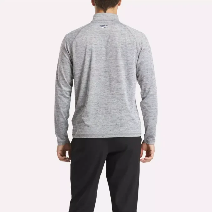 Sudadera con cremallera de un cuarto y tejido catiónico para hombre Sudadera con cremallera de un cuarto y tejido catiónico para hombre